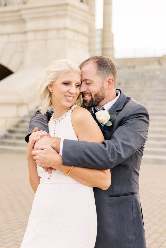 Bride and groom photos at the Kansas State Capitol by Topeka Wedding Photographer Sarah Riner Photography