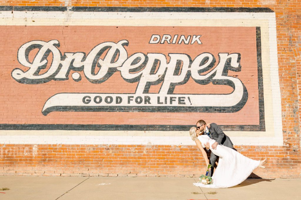 Bride and groom photos at the NOTO Arts Center by Topeka Wedding Photographer Sarah Riner Photography